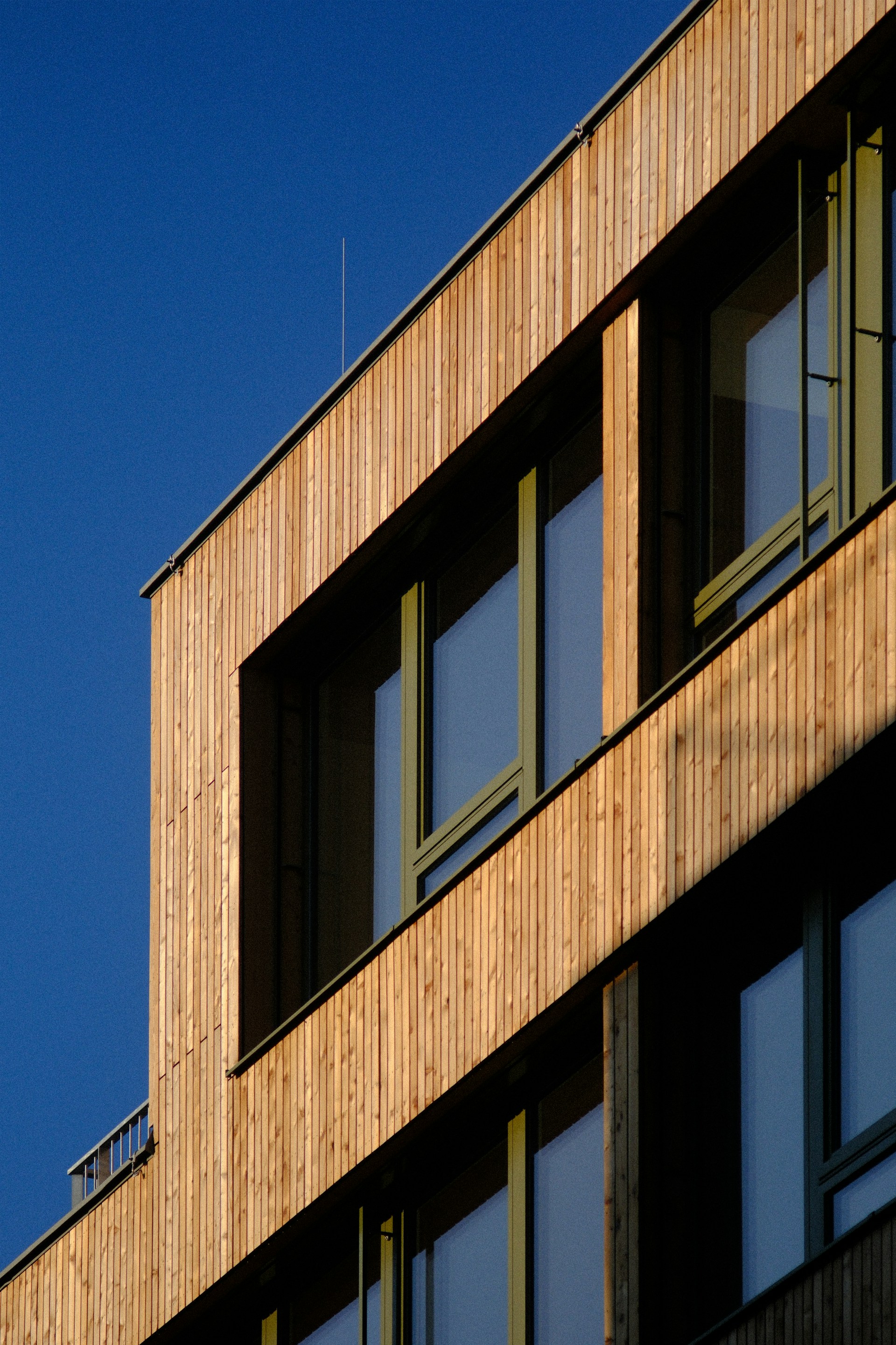 Finished exterior wood siding and architectural paneling